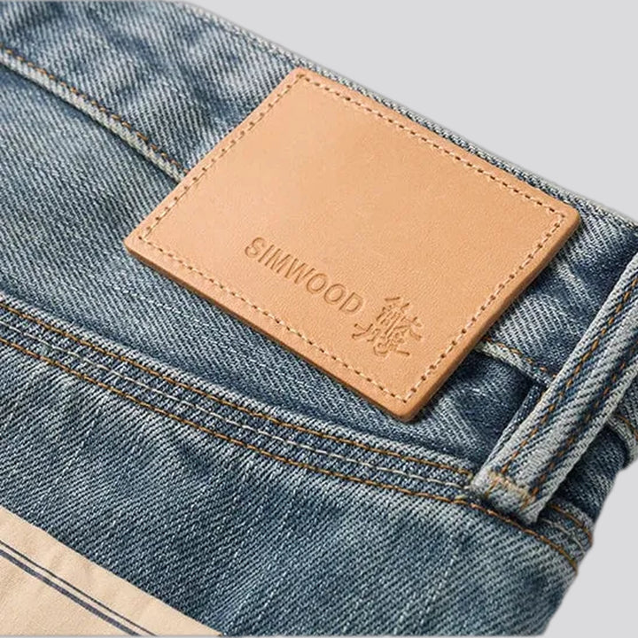 Distressed straight fit selvedge men's jeans