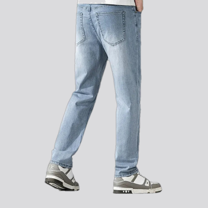 Mid rise light sanded men's jeans