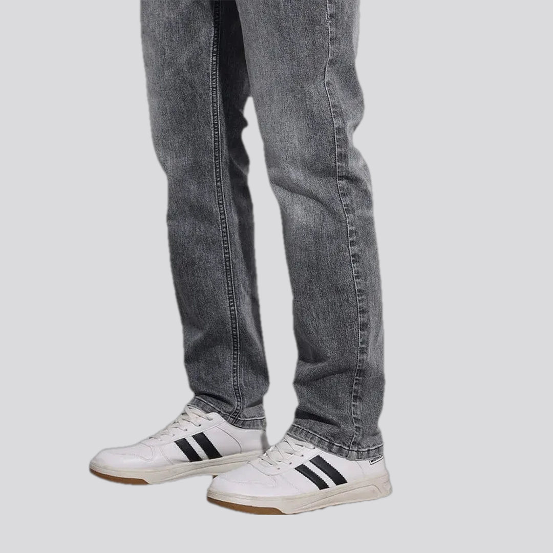 Abraded stonewashed slim men's jeans